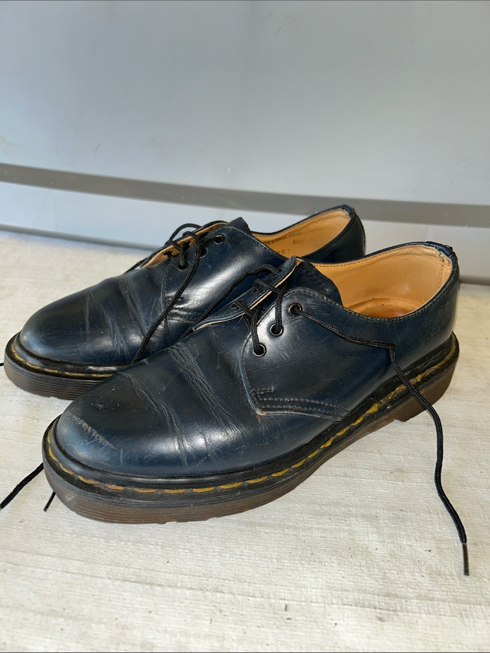 Dr. Martens Black Leather Derby Shoes with Yellow Welt Stitching